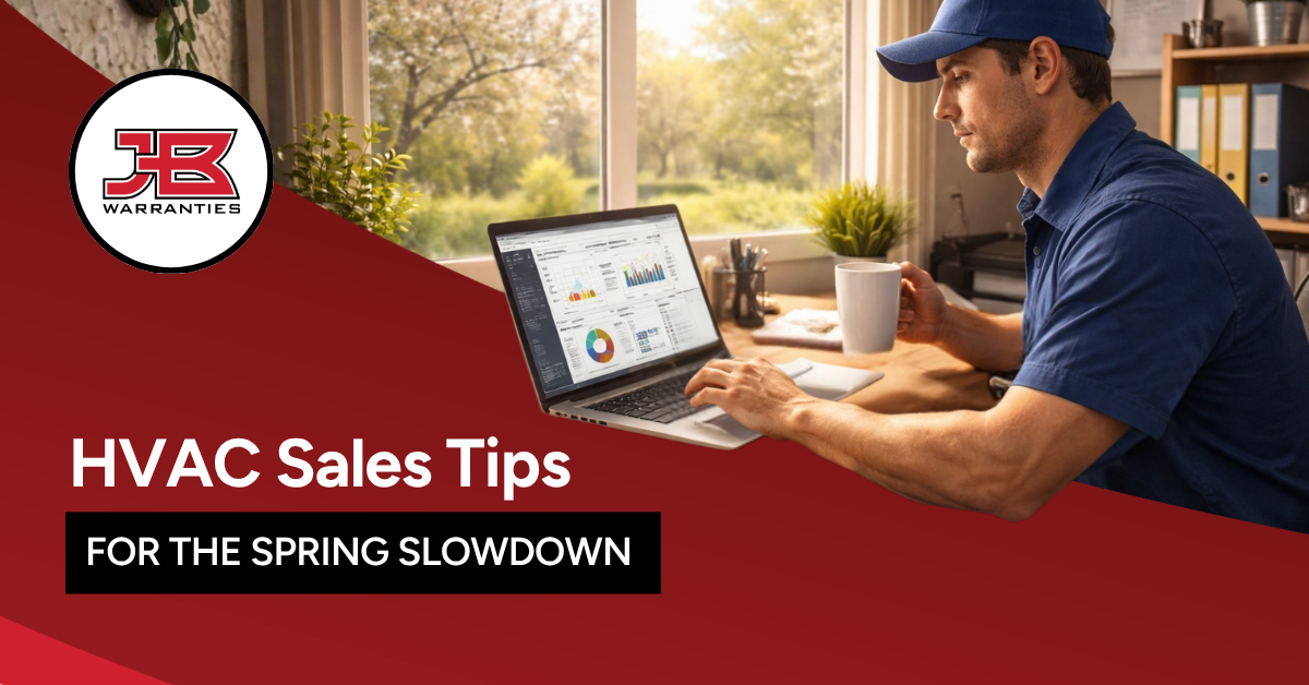 HVAC contractor working on a laptop at his desk with spring sunlight and blooming trees visible through the window. The words on the image say, "HVAC Sales Tips: For the Spring Slowdown."